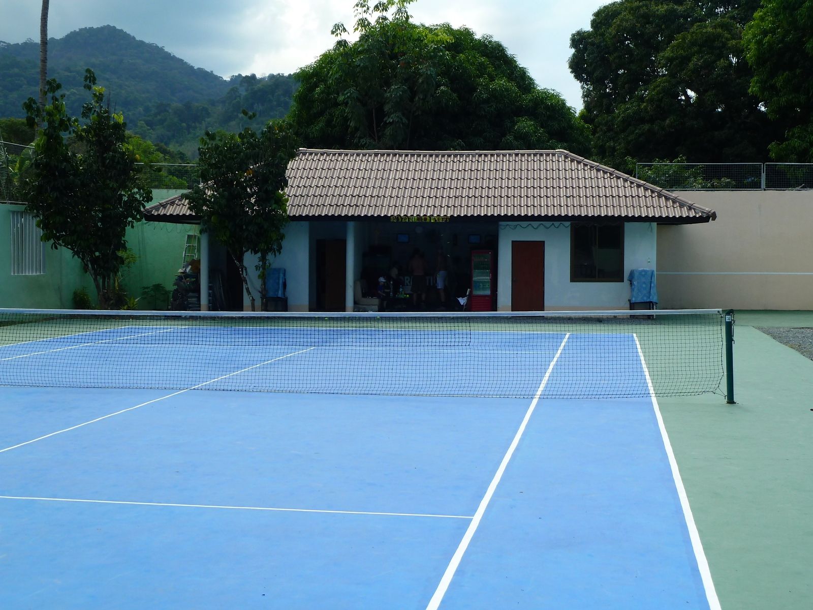 tennis-tourist-koh-chang-thailand-tennis-club-pro-shop-and-mountains-teri-church