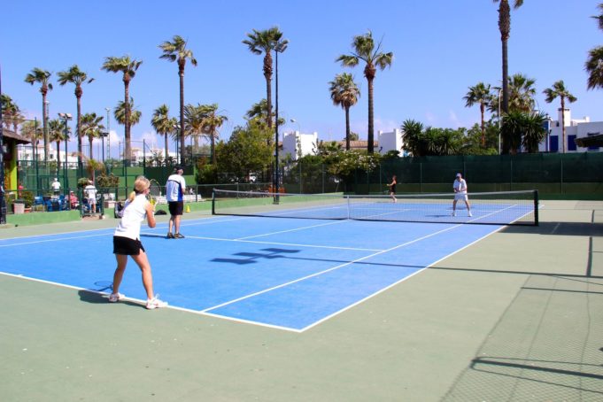 tennis-tourist-octogono-tennis-club-wide-shot-courts-tennis-players-from-behind-sotogrande-spain-teri-church