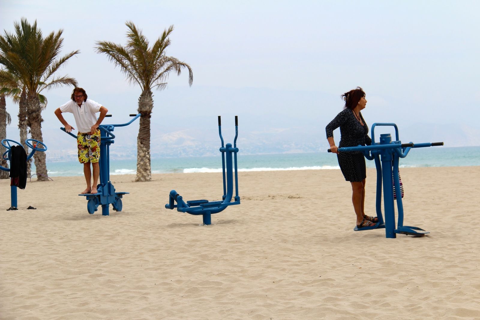 tennis-tourist-playa-san-juan-exercise-machines-on-beach-alicante-spain-beach-teri-church