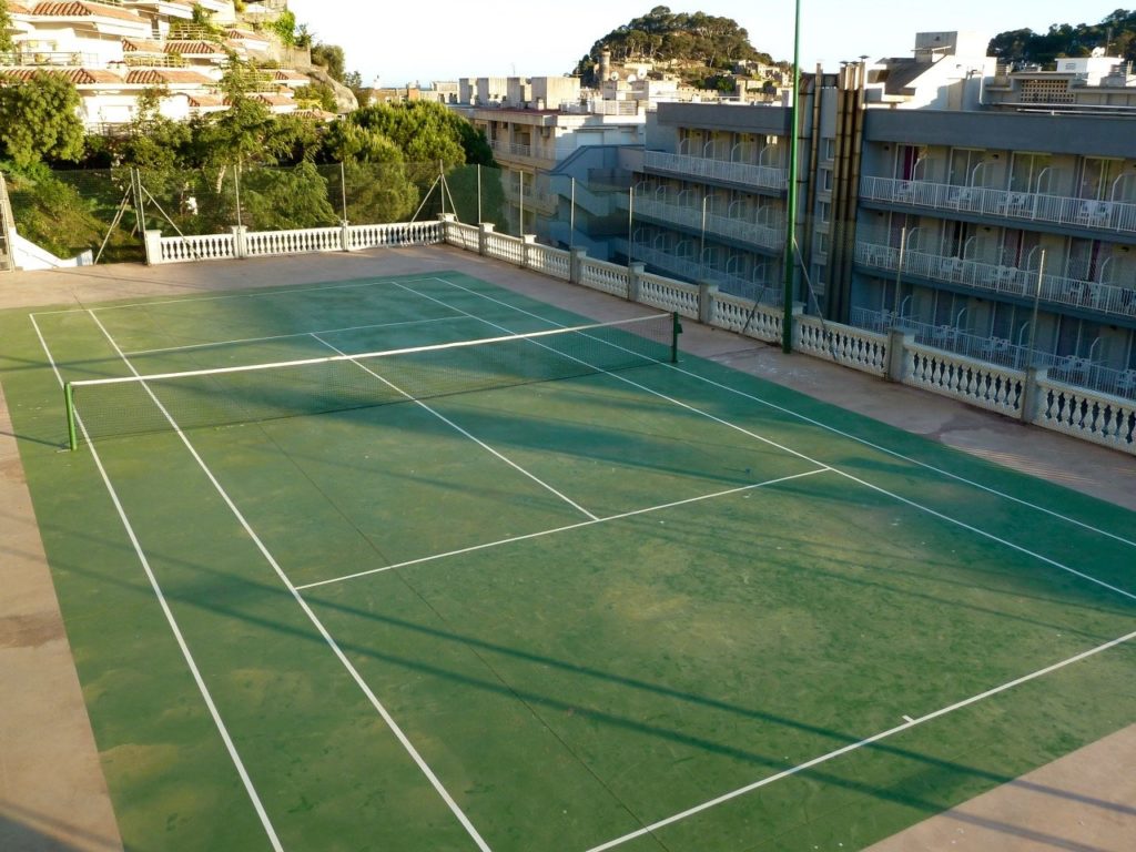 tennis-tourist-tossa-de-mar-spain-hotel-don-juan-tennis-court-side-angle-teri-church